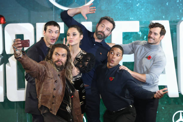 Actors Jason Momoa, Ezra Miller, Gal Gadot, Ben Affleck, Ray Fisher and Henry Cavill attend the 'Justice League' photocall at The College on November...