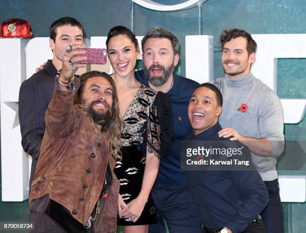 Jason Momoa, Ezra Miller, Gal Gadot, Ben Affleck, Ray Fisher and Henry Cavill attend the 'Justice League' photocall at The College on November 4,...