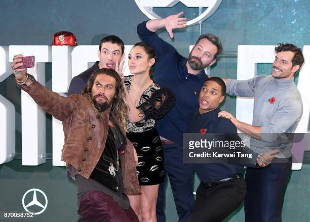 Jason Momoa, Ezra Miller, Gal Gadot, Ben Affleck, Ray Fisher and Henry Cavill attend the 'Justice League' photocall at The College on November 4,...