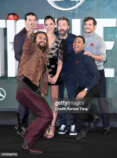 Jason Momoa, Ezra Miller, Gal Gadot, Ben Affleck, Ray Fisher and Henry Cavill attend the 'Justice League' photocall at The College on November 4,...