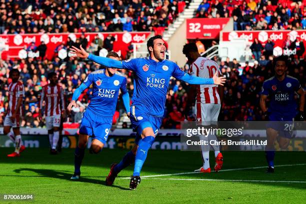 Vicente Iborra of Leicester City celebrates scoring the opening goal during the Premier League match between Stoke City and Leicester City at Bet365...