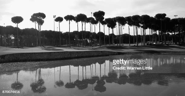 Players walk onto the 11th green during the third round of the Turkish Airlines Open at the Regnum Carya Golf & Spa Resort on November 4, 2017 in...