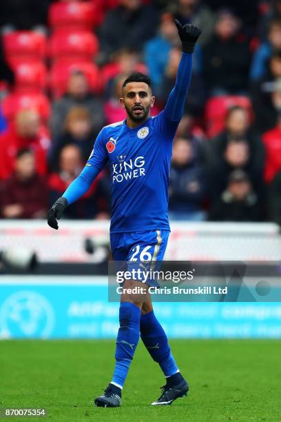 Riyad Mahrez of Leicester City celebrates scoring his side's second goal during the Premier League match between Stoke City and Leicester City at...
