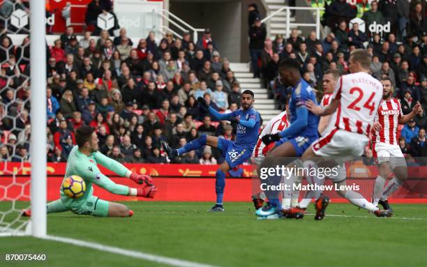 Riyad Mahrez of Leicester City scores his sides second goal during the Premier League match between Stoke City and Leicester City at Bet365 Stadium...