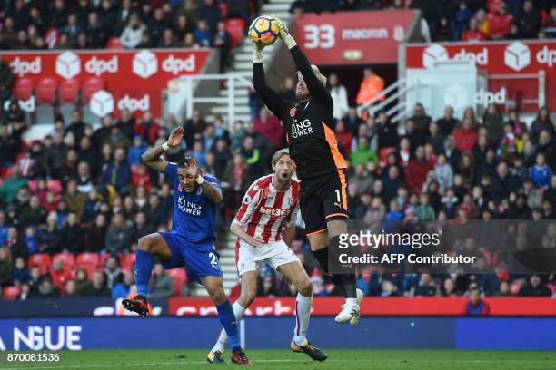 Leicester City's Danish goalkeeper Kasper Schmeichel catches the ball during the English Premier League football match between Stoke City and...