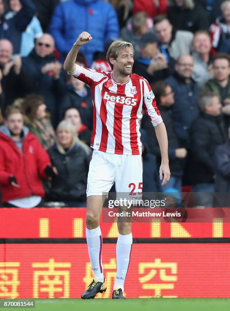 Peter Crouch of Stoke City celebrates scoring his sides second goal during the Premier League match between Stoke City and Leicester City at Bet365...