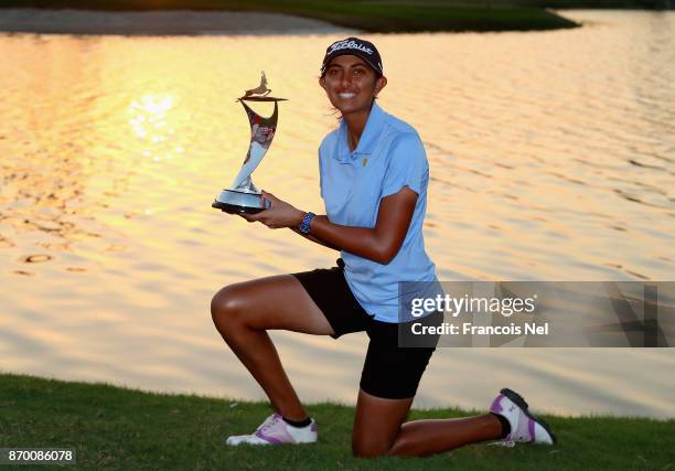 Aditi Ashok of India poses with the trophy following her victory during Day Four of the Fatima Bint Mubarak Ladies Open at Saadiyat Beach Golf Club...