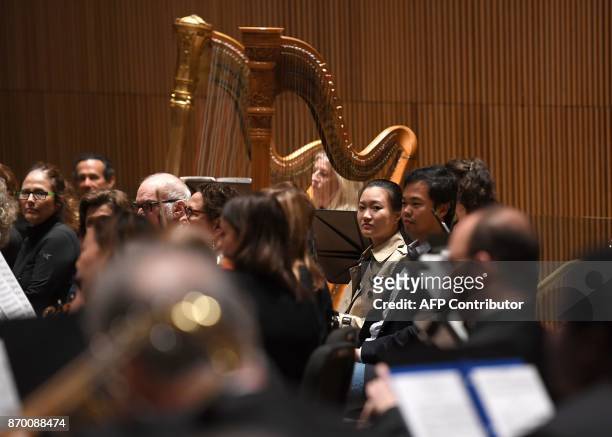 The audience joins musicians of the Park Avenue Chamber Symphony on stage during "InsideOut" at DiMenna Center in New York on October 28, 2017....