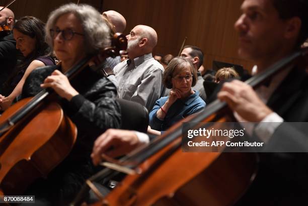 The audience joins musicians of the Park Avenue Chamber Symphony on stage during "InsideOut" at DiMenna Center in New York on October 28, 2017....