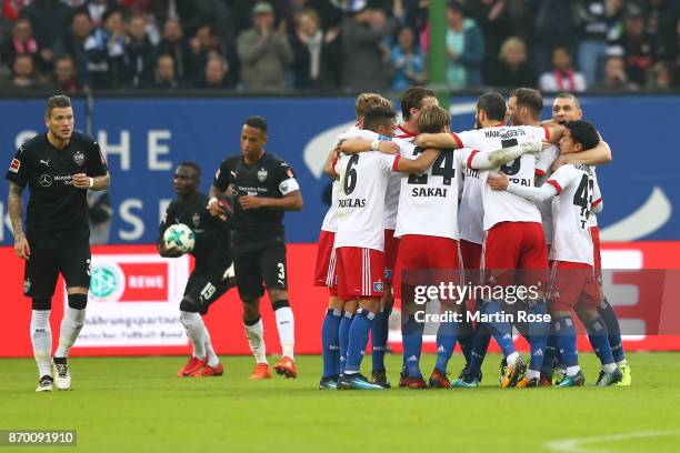 Players of Hamburg celebrate their first goal scored by Aaron Hunt of Hamburg to make it 1:0 during the Bundesliga match between Hamburger SV and VfB...