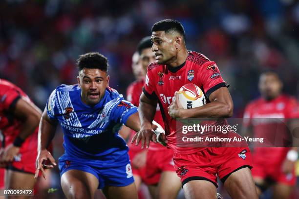 Daniel Tupou of Tonga makes a break during the 2017 Rugby League World Cup match between Samoa and Tonga at Waikato Stadium on November 4, 2017 in...