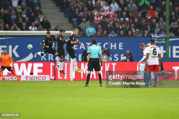 Aaron Hunt of Hamburg shoots a free kick that leads to a goal to make it 1:0 during the Bundesliga match between Hamburger SV and VfB Stuttgart at...