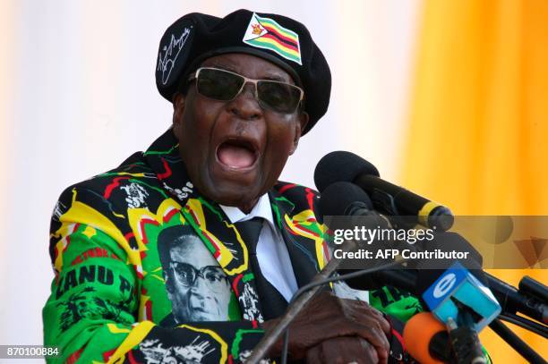 Zimbabwe's President Robert Mugabe delivers a speech during the Zimbabwe ruling party Zimbabwe African National Union- Patriotic Front youth...