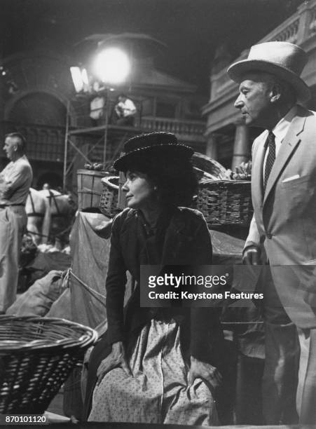 Actress Audrey Hepburn with costume designer Cecil Beaton on the set of the film 'My Fair Lady', August 1963.