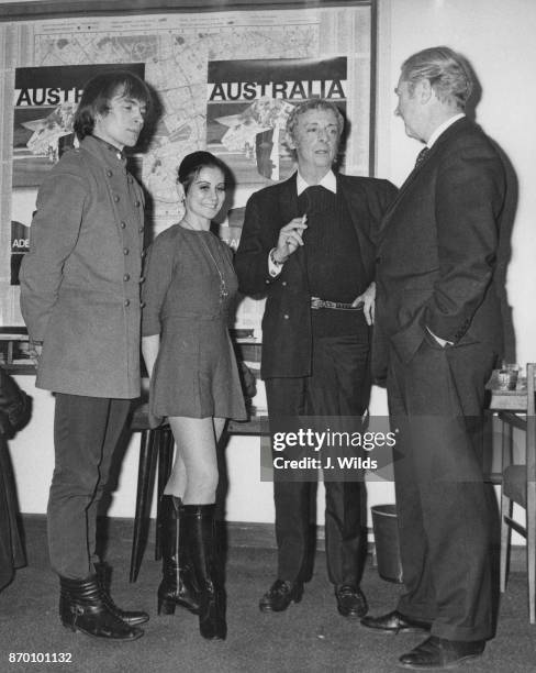 From left to right, ballet dancers Rudolf Nureyev, Lucette Aldous and Sir Robert Helpmann with agent Mr Milne, at a press conference at the Qantas...