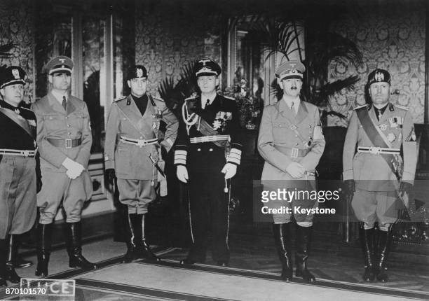 From second left to right, Rudolf Hess, Count Ciano, Joachim von Ribbentrop, Adolf Hitler and Benito Mussolini at the Littorio Palace in Rome, Italy,...