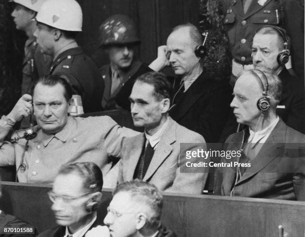From left to right, Hermann Goering, Rudolf Hess, and Joachim von Ribbentrop face justice at the Nuremberg Trials following World War II, circa 1946.