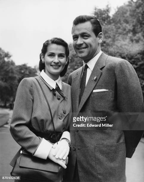 American actor William Holden and his wife, actress Brenda Marshall shortly after their arrival in London, 27th May 1952.