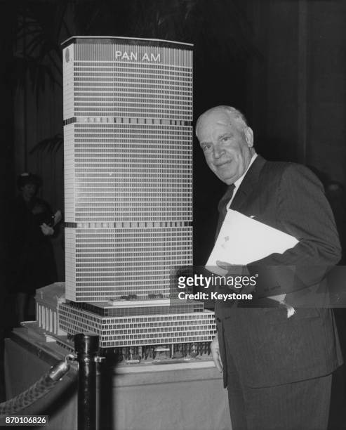 American businessman and politician Luther Hartwell Hodges with a model of the Pan Am Building at the Waldorf Astoria in New York City, circa 1960.