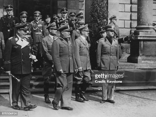From left to right, Field Marshal Hermann Goering, Rudolf Hess, Italian leader Benito Mussolini, German Chancellor Adolf Hitler and Italian Foreign...