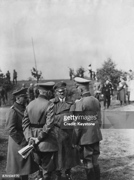 From left to right, General von Fritsch, Defence Minister and General Werner von Blomberg, German Chancellor Adolf Hitler and General Liebmann during...