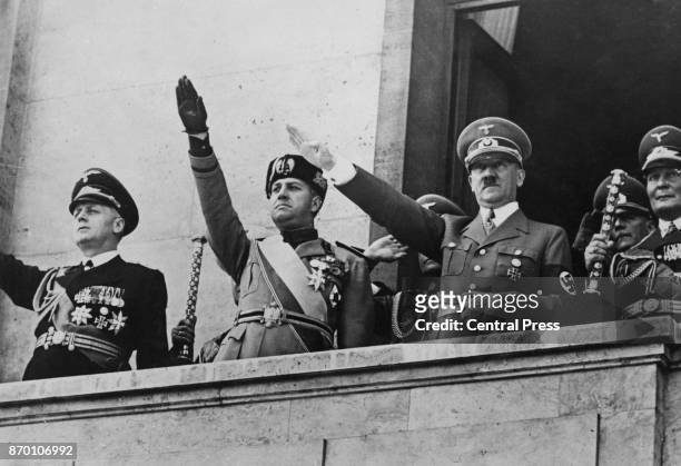 From left to right, German Foreign Minister Joachim von Ribbentrop, Italian Foreign Minister Count Ciano, German Chancellor Adolf Hitler and Field...