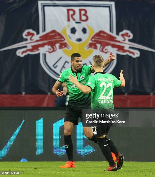 Jonathas de Jesus of Hannover jubilates after scoring the first goal during the Bundesliga match between RB Leipzig and Hannover 96 at Red Bull Arena...