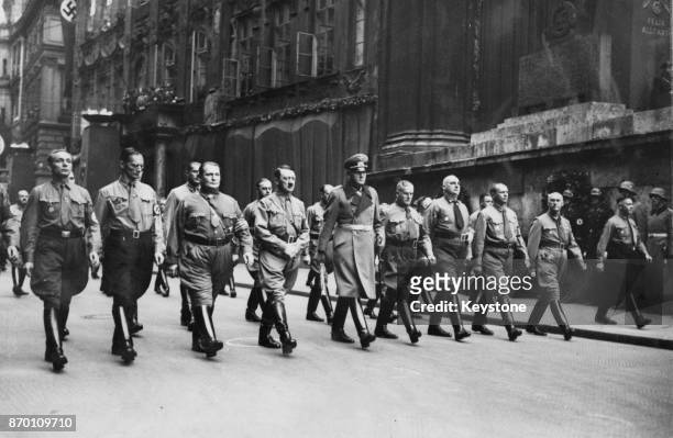 German Chancellor Adolf Hitler , Hermann Goering and Werner von Blomberg lead a procession of Nazis to the Munich Burgerbrau Cellar, to commemorate...