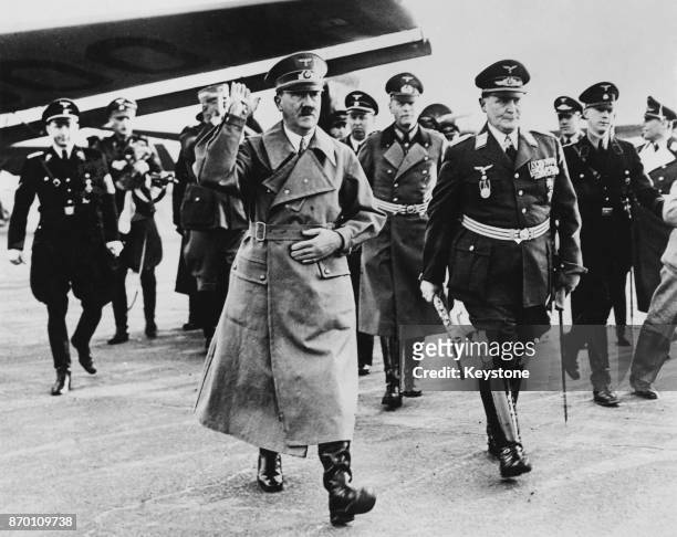 German Chancellor Adolf Hitler is met by Hermann Goering at Tempelhof Aerodrome, Berlin, on his return from Vienna, March 1938.