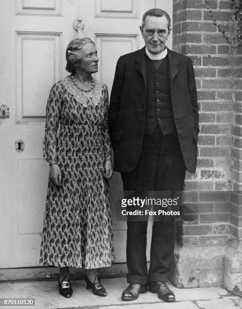 William Inge , former Dean of St Paul's Cathedral, with his wife Mary at their home, Brightwell House in Brightwell, Berkshire, after his retirement,...