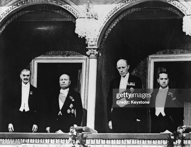 From left to right, British Prime Minister Neville Chamberlain , Italian leader Benito Mussolini , Lord Halifax , the British Foreign Secretary, and...