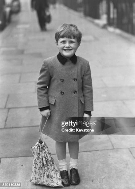 Winston Churchill , grandson of the wartime Prime Minister and son of Randolph Churchill, after his first day at school, 5th October 1945.