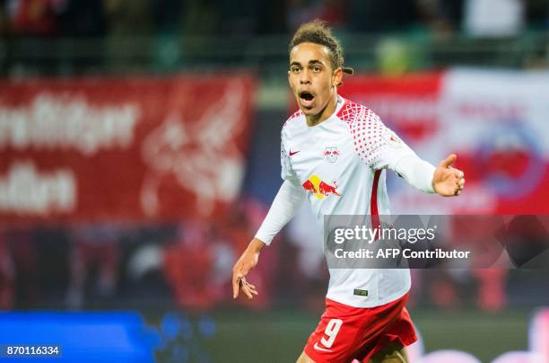 Leipzig's Danish forward Yussuf Poulsen celebrates after scoring during the German first division Bundesliga football match RB Leipzig vs Hannover 96...