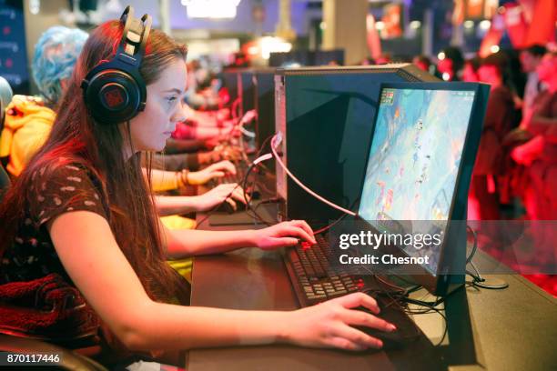 An e-sport player competes during an electronic video game tournament at the 'Paris Games Week' on November 04, 2017 in Paris, France. E-sport for...