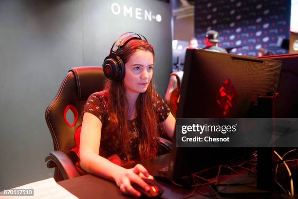 An e-sport player competes during an electronic video game tournament at the 'Paris Games Week' on November 04, 2017 in Paris, France. E-sport for...