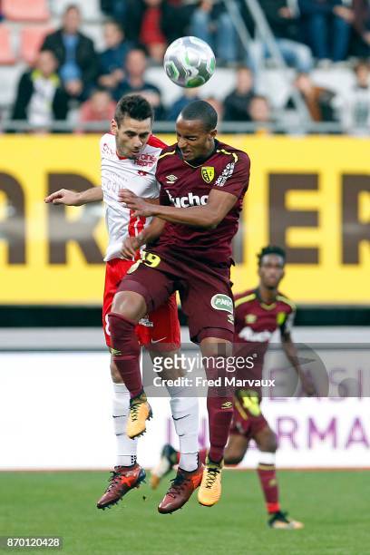 Vincent Marchetti of Nancy and Frederic Duplus of Lens during the French Ligue 2 match between Nancy and Lens at Stade Marcel Picot on November 4,...