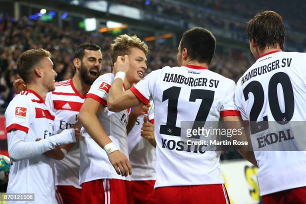 Filip Kostic of Hamburg celebrates with Jann-Fiete Arp of Hamburg after Arp scored a goal to make it 3:1 during the Bundesliga match between...