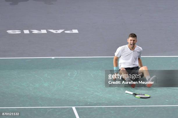 Filip Krajinovic of Serbia reacts after winning his men's singles semi final match against John Isner of the United States of America during day six...