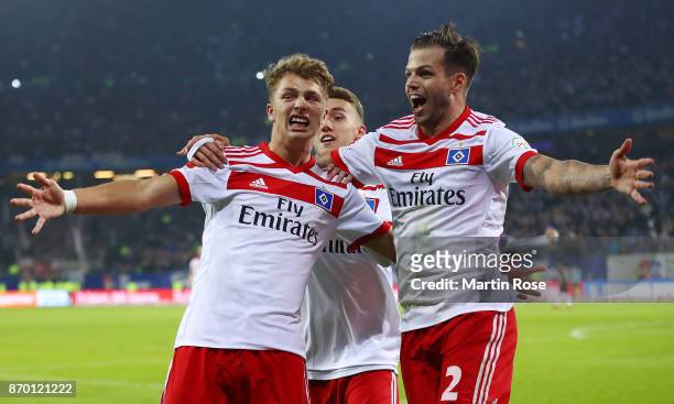 Jann-Fiete Arp of Hamburg celebrates with Dennis Diekmeier of Hamburg after he scored a goal to make it 3:1 during the Bundesliga match between...