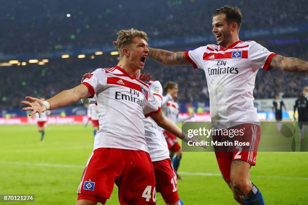 Jann-Fiete Arp of Hamburg celebrates with Dennis Diekmeier of Hamburg after he scored a goal to make it 3:1 during the Bundesliga match between...