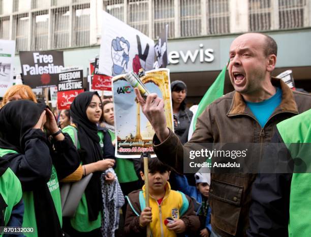 Protester reacts against pro-Palestinian supporters during a national march through central London, England, on November 4, 2017 as they demand...