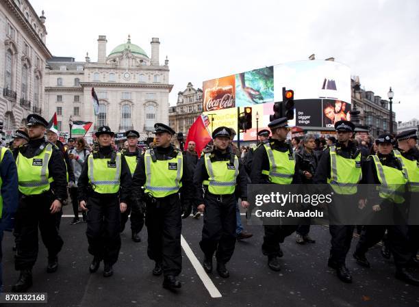 Police contain a Pro-Palestinian national march against a counter Israeli demo through central London, England, on November 4, 2017 as pro-...