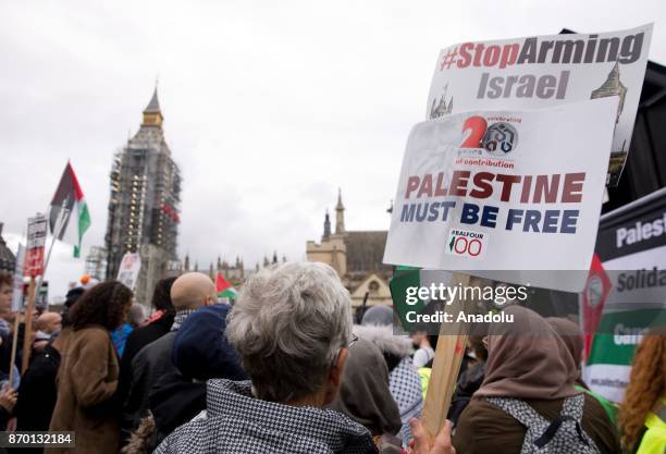 Pro-Palestinian supporters join national march through central London, England, on November 4, 2017 as they demand justice and equal rights for...