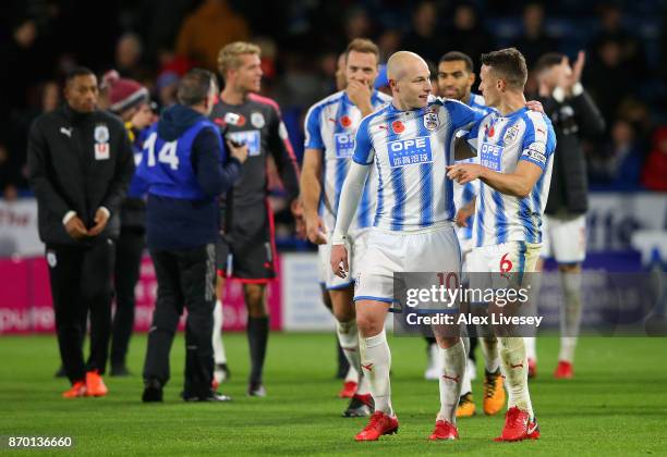 Joe Lolley of Huddersfield Town and Jonathan Hogg of Huddersfield Town celebrates after the Premier League match between Huddersfield Town and West...