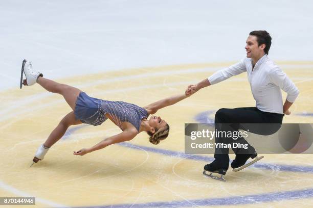 Kristen Moore-Towers and Michael Marinaro of Canada perform during the Pairs Free Skating on Day 2 of Audi Cup of China ISU Grand Prix of Figure...