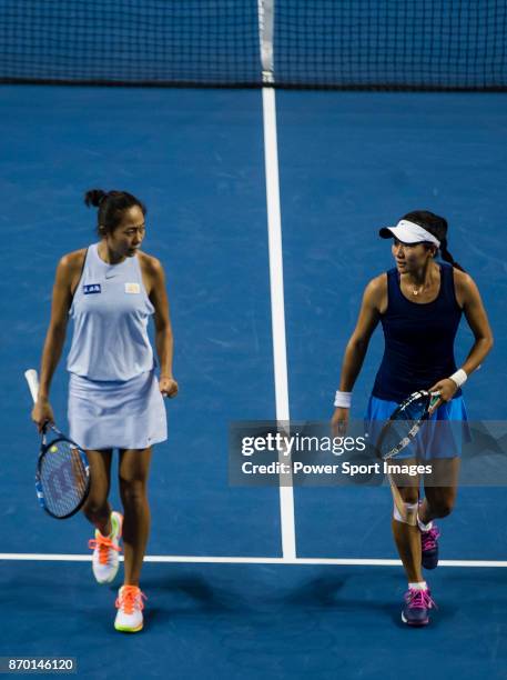 Jing-Jing Lu and Shuai Zhang of China talk during the doubles Round Robin match of the WTA Elite Trophy Zhuhai 2017 against Xinyu Jiang and Qianhui...