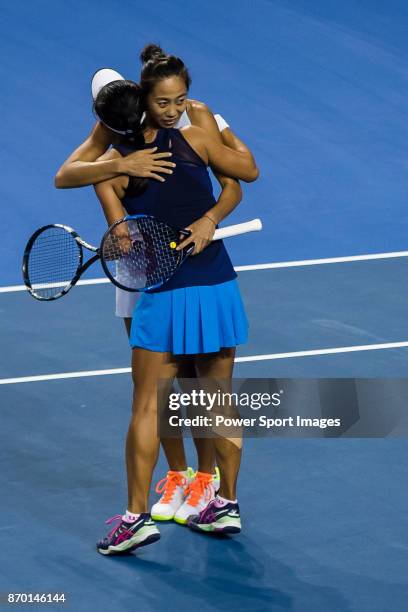 Jing-Jing Lu and Shuai Zhang of China celebrate winning the doubles Round Robin match of the WTA Elite Trophy Zhuhai 2017 against Xinyu Jiang and...