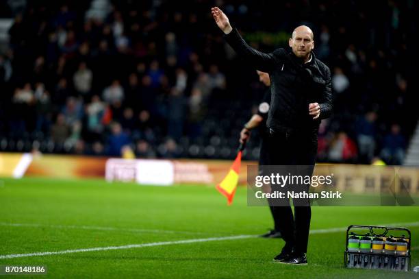 Jaap Stam manager of Reading throws his chewing gum during the Sky Bet Championship match between Derby County and Reading at iPro Stadium on...