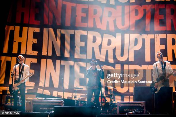 Kevin Bivona, Aimee Interrupter and Justin Bivona members of the band The Interrupters performs live on stage at Arena Anhembi on November 3, 2017 in...