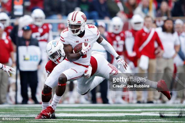 Quintez Cephus of the Wisconsin Badgers runs after a catch in the second quarter of a game against the Indiana Hoosiers at Memorial Stadium on...